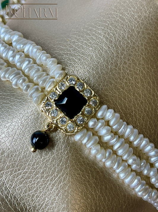 White Choker black stone